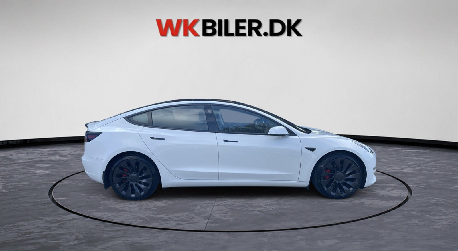 Hvid Tesla Model 3 fra 2023
