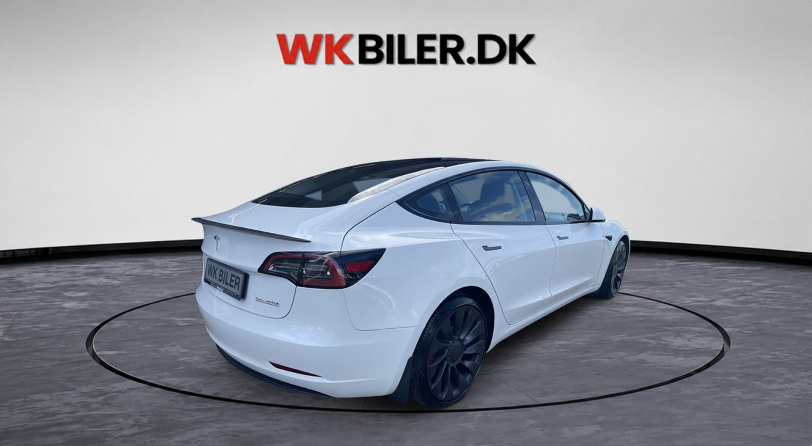 Hvid Tesla Model 3 fra 2023