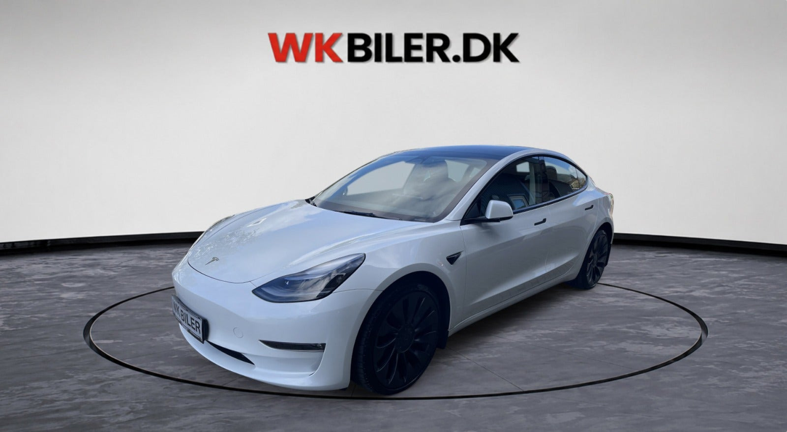 Hvid Tesla Model 3 fra 2023