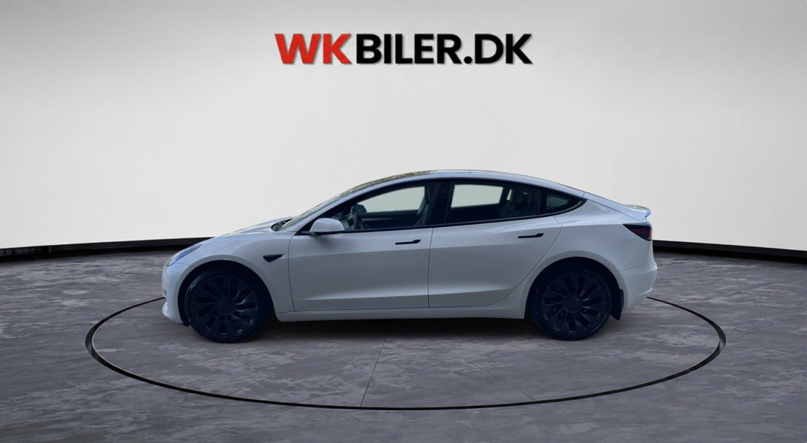 Hvid Tesla Model 3 fra 2023