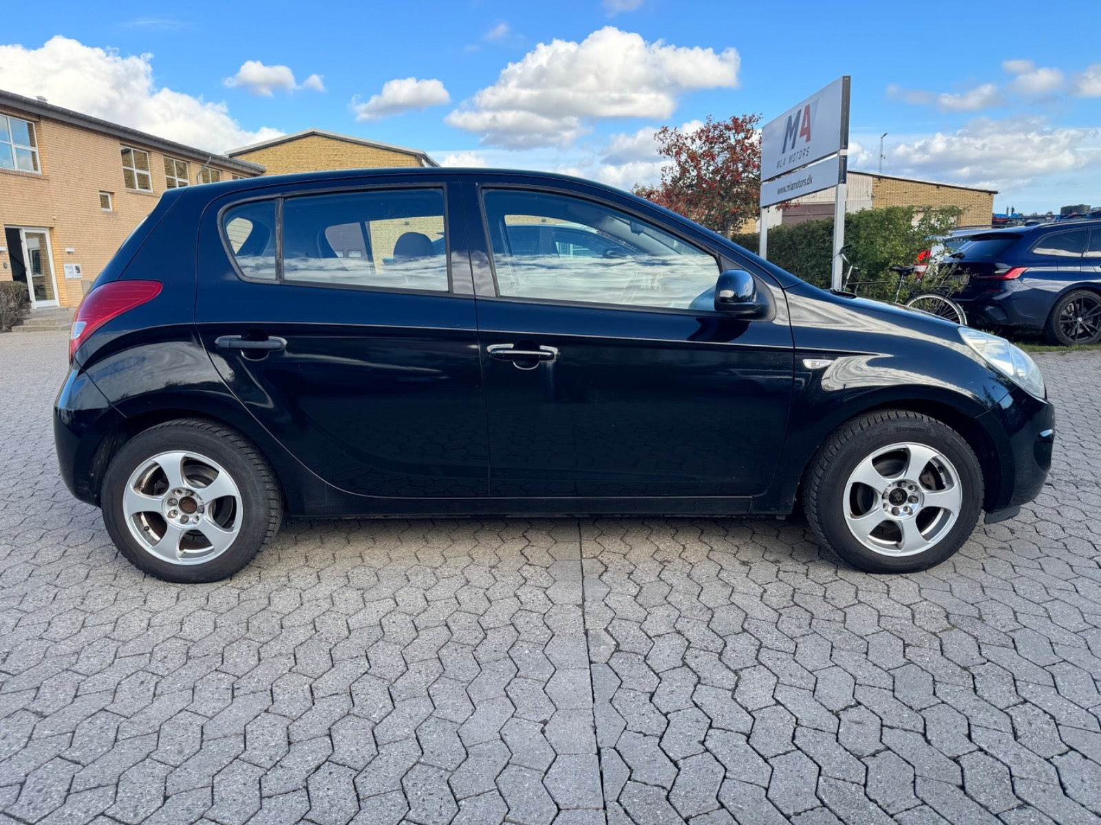 Rød Hyundai i20 fra 2009