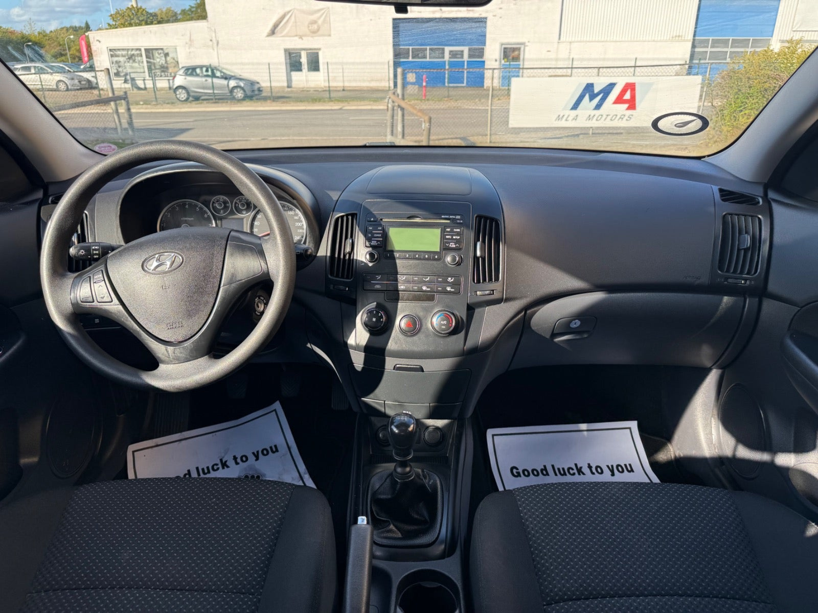 Rød Hyundai i30 fra 2010