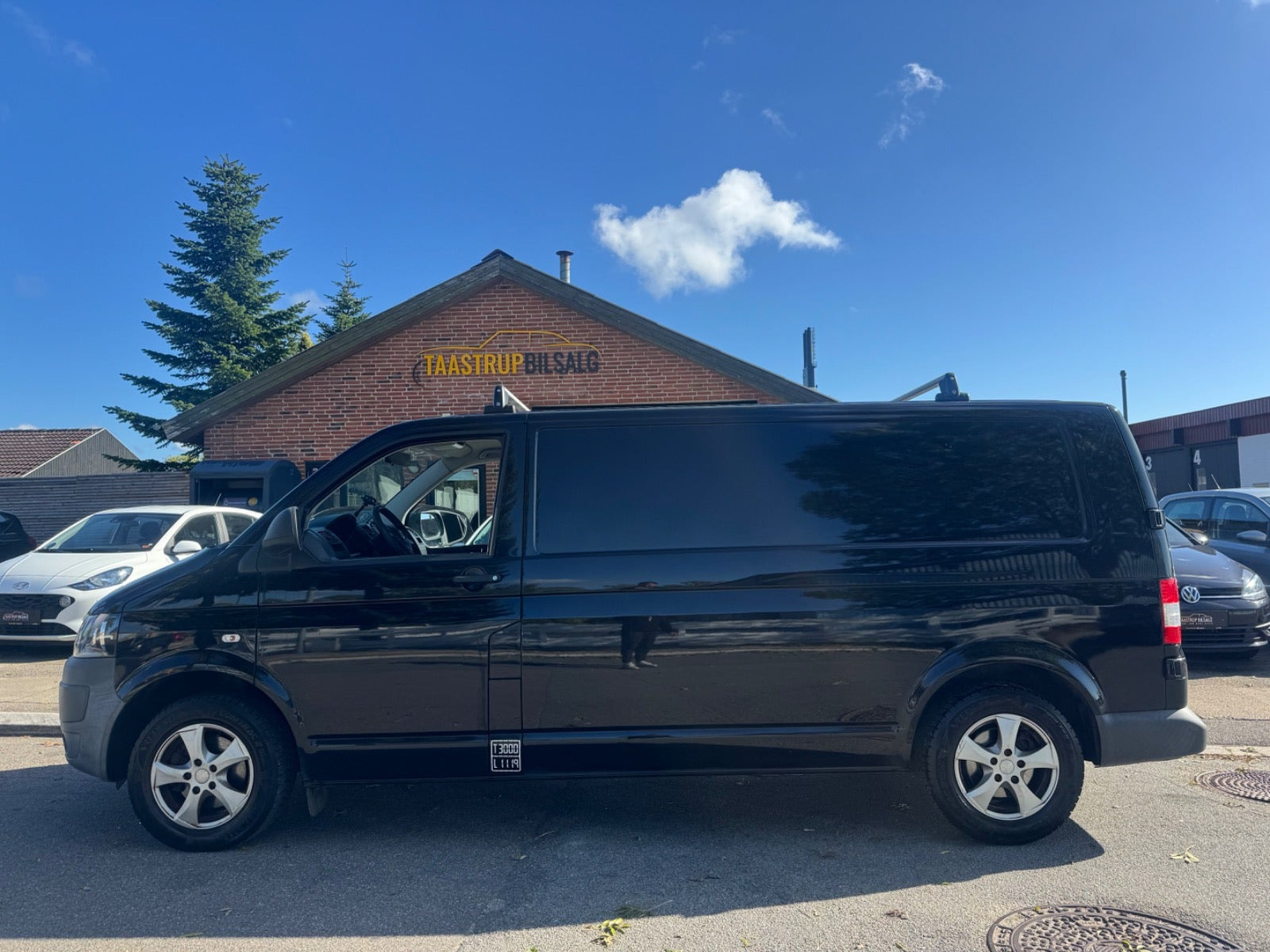 Gul VW Transporter fra 2013