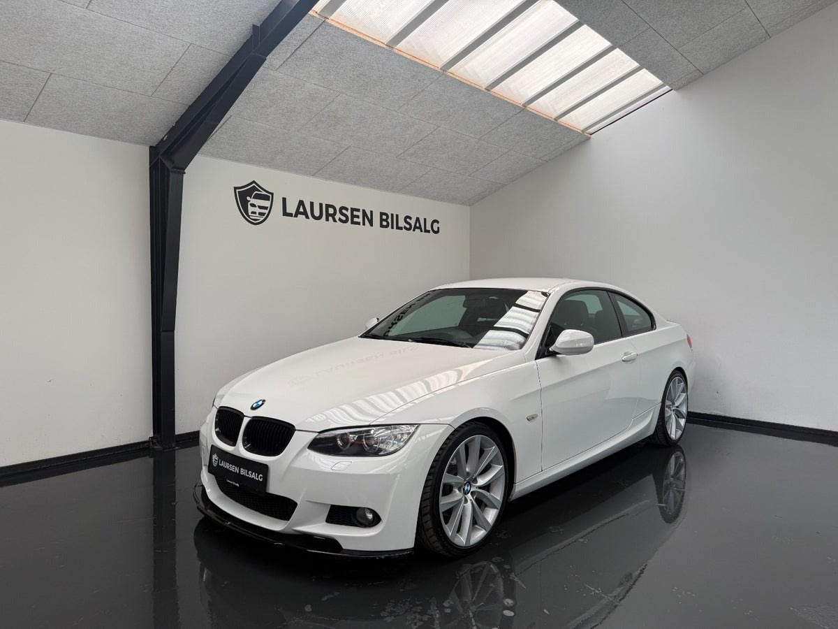 Hvid BMW 320d fra 2010