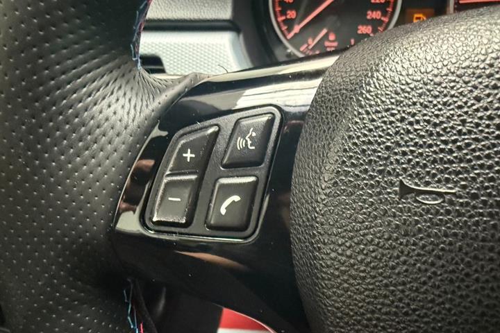 Hvid BMW 320d fra 2010