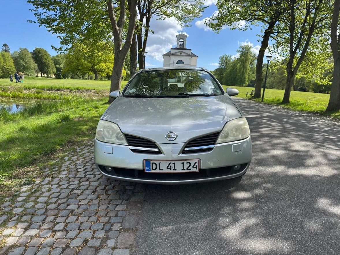 Beige Nissan Primera fra 2006