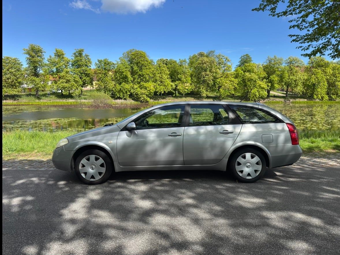 Beige Nissan Primera fra 2006