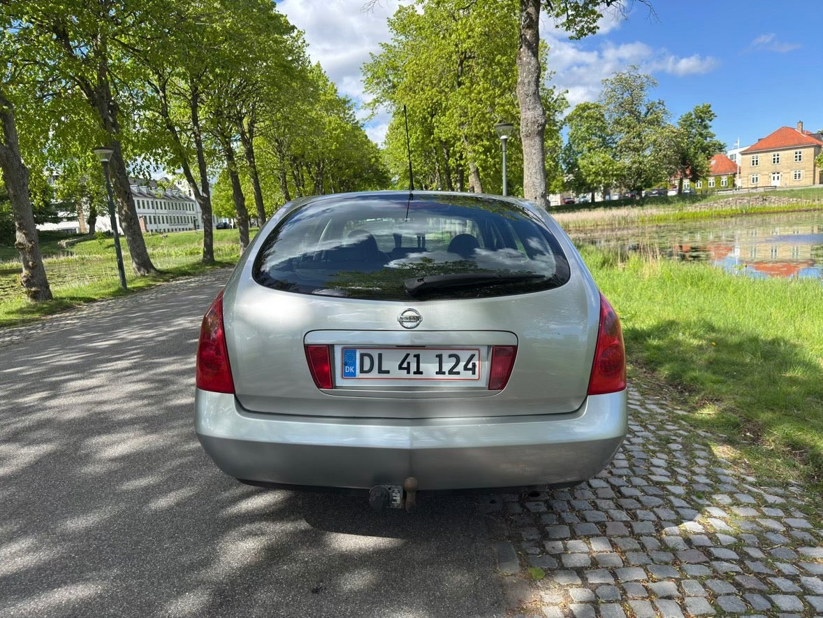 Beige Nissan Primera fra 2006