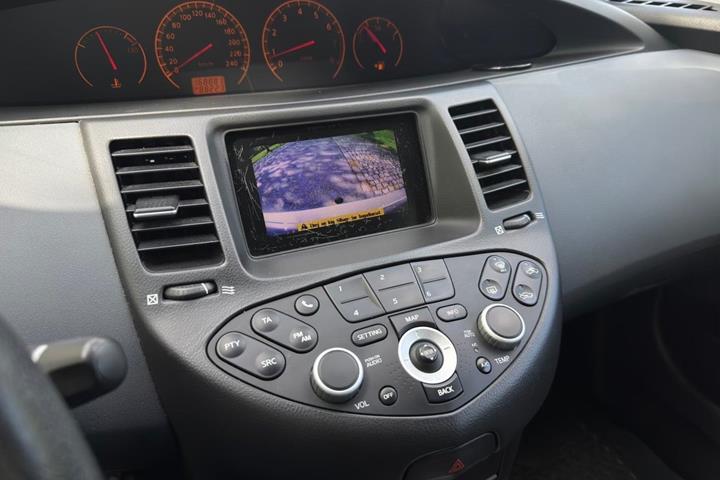 Beige Nissan Primera fra 2006
