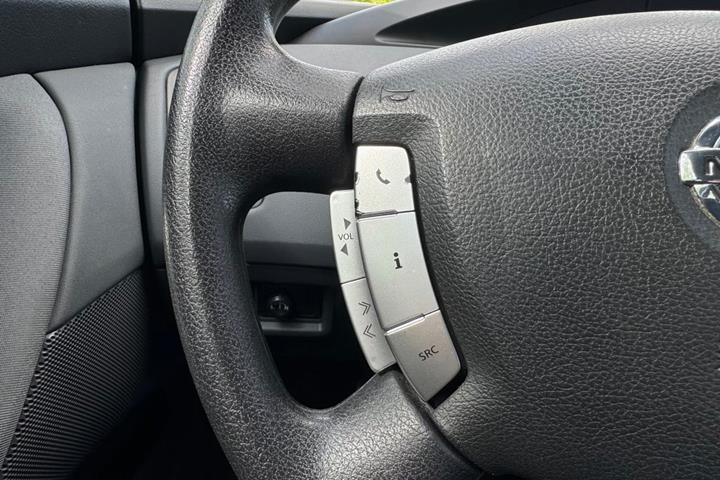 Beige Nissan Primera fra 2006
