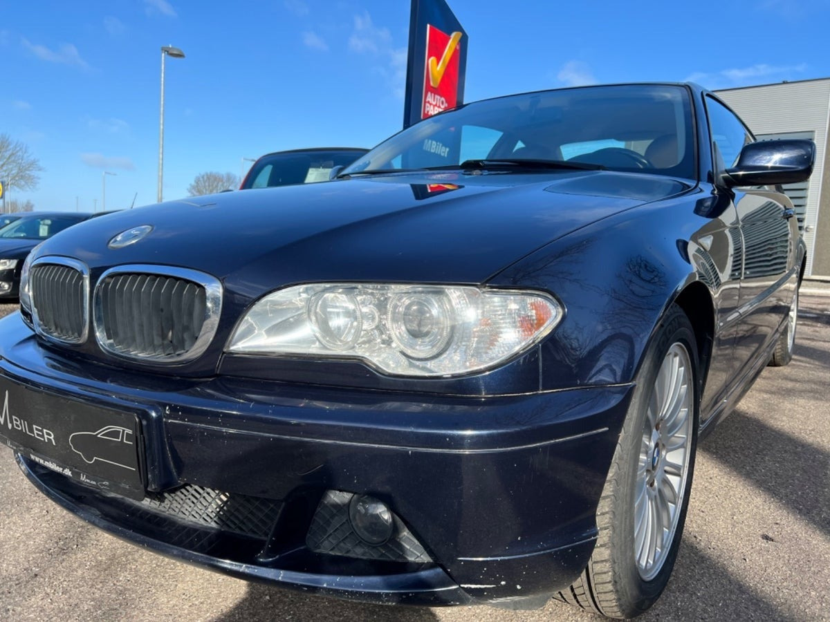 Blå BMW 318Ci fra 2003