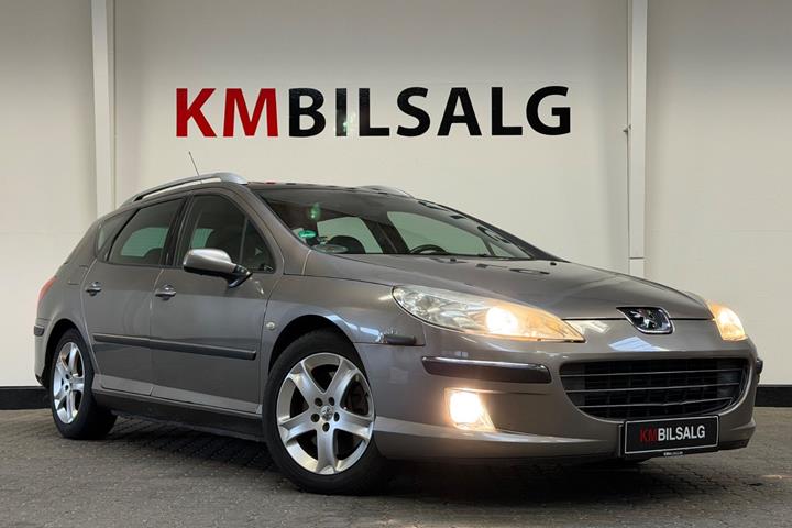 Orange Peugeot 407 fra 2005