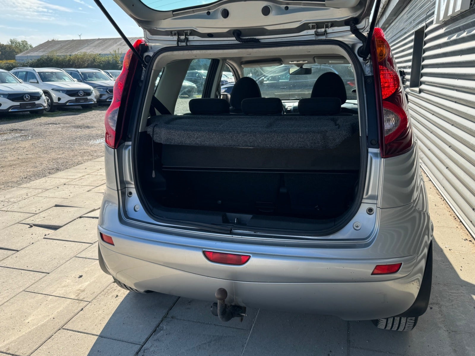 Sølv Nissan Note fra 2010