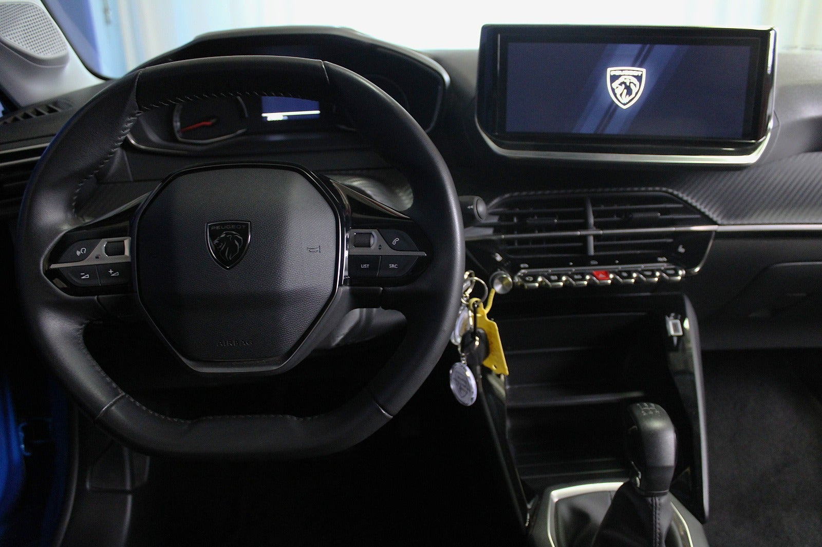Blå Peugeot 208 fra 2024