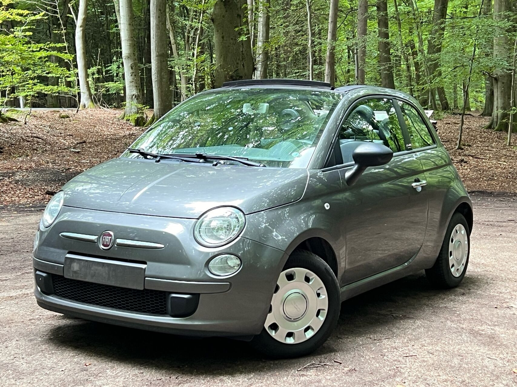 Grå Fiat 500C fra 2011