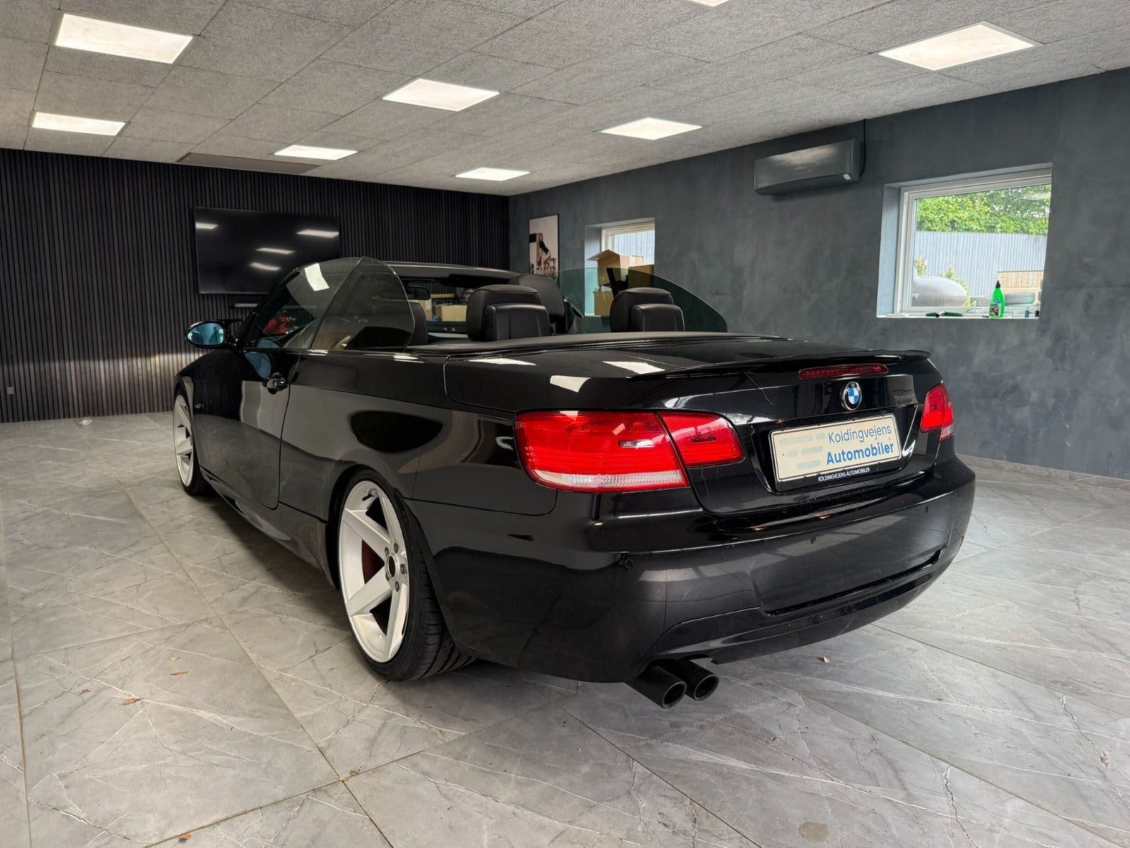 Rød BMW 325Ci fra 2006