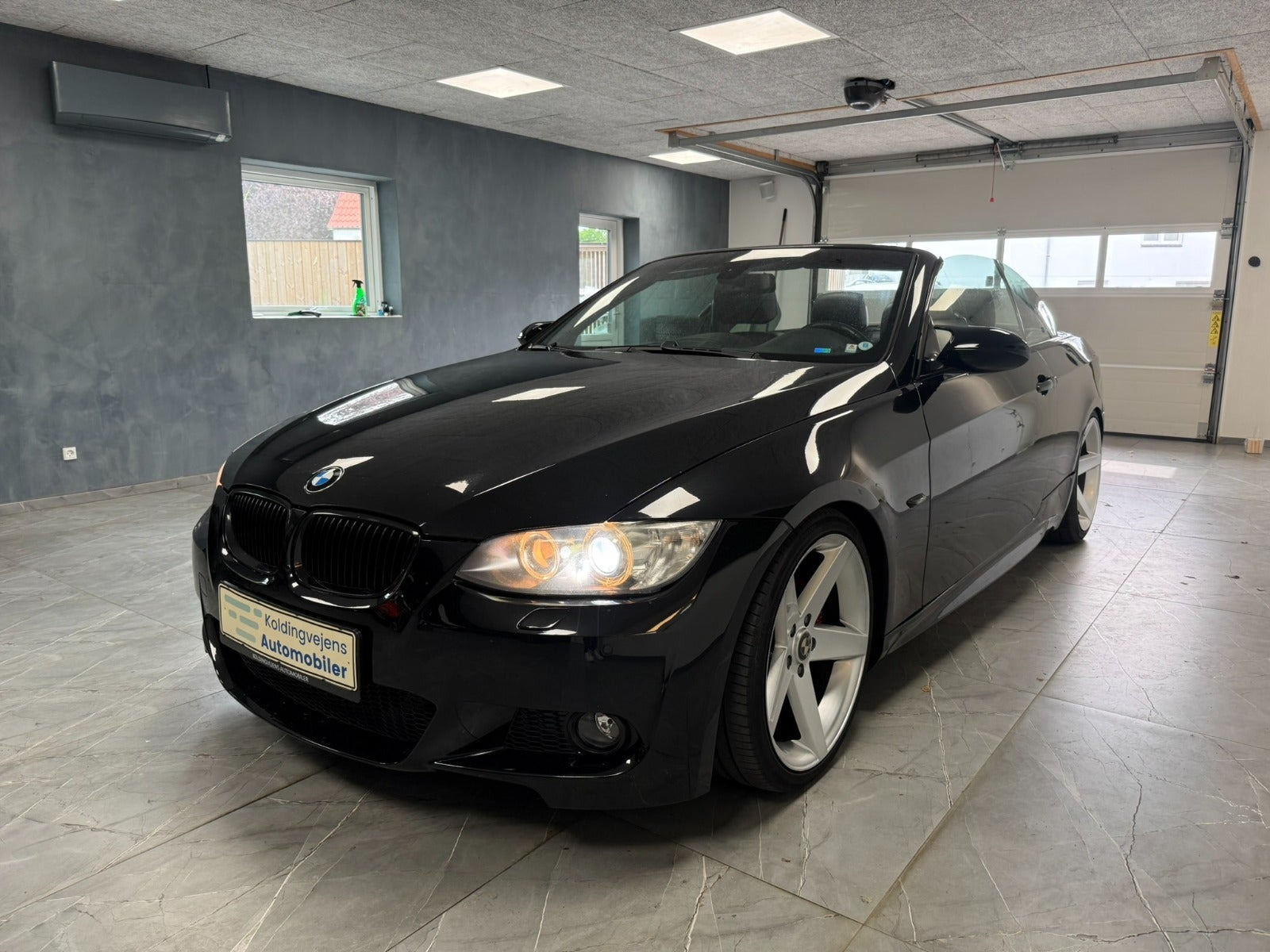 Rød BMW 325Ci fra 2006
