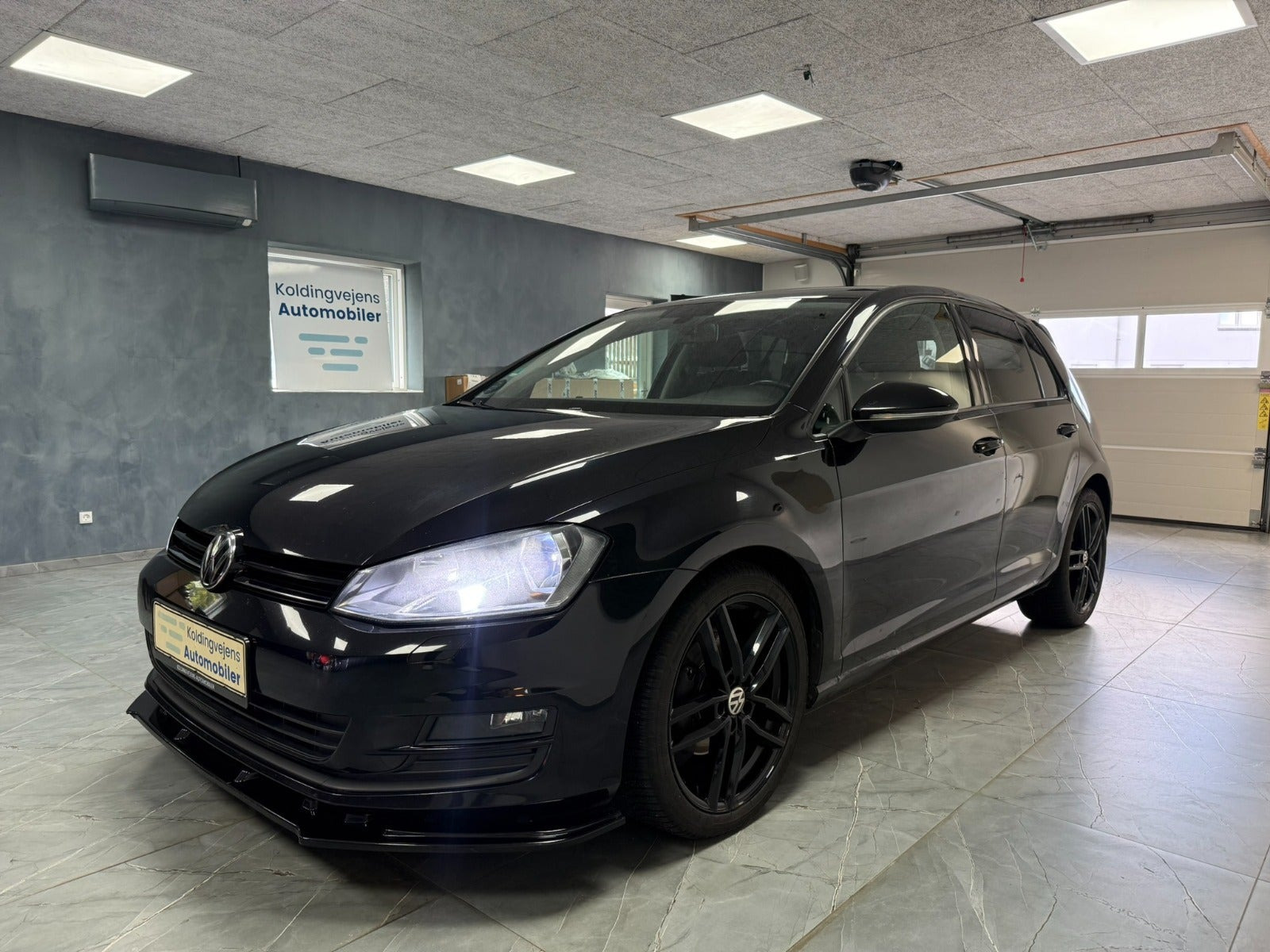 Rød VW Golf VII fra 2013