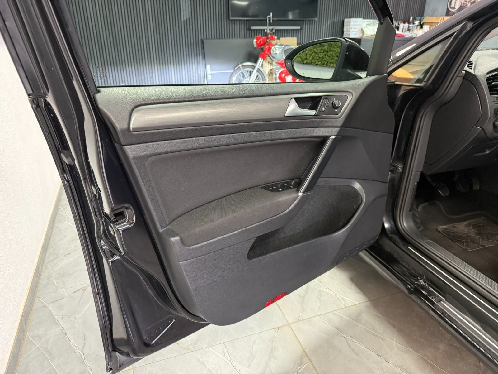 Rød VW Golf VII fra 2013