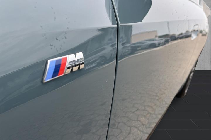 Grøn BMW iX1 fra 2024