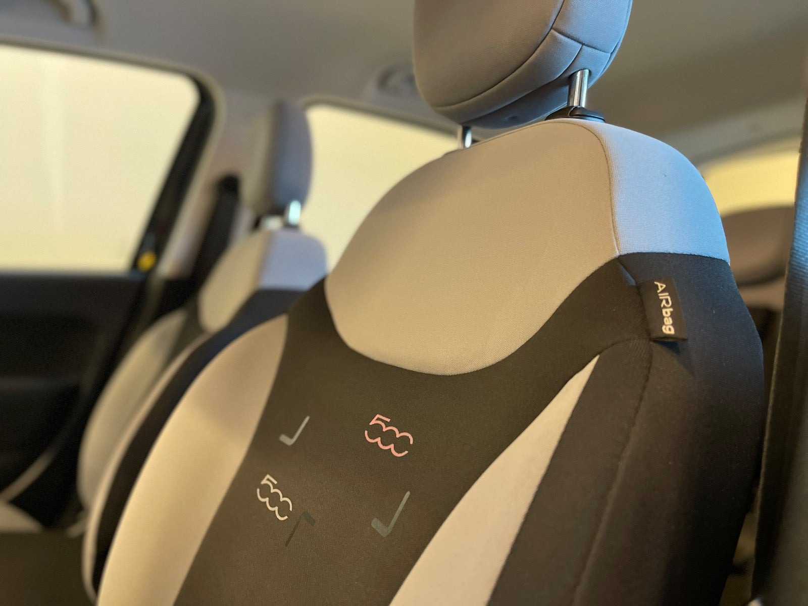 Grå Fiat 500L fra 2014