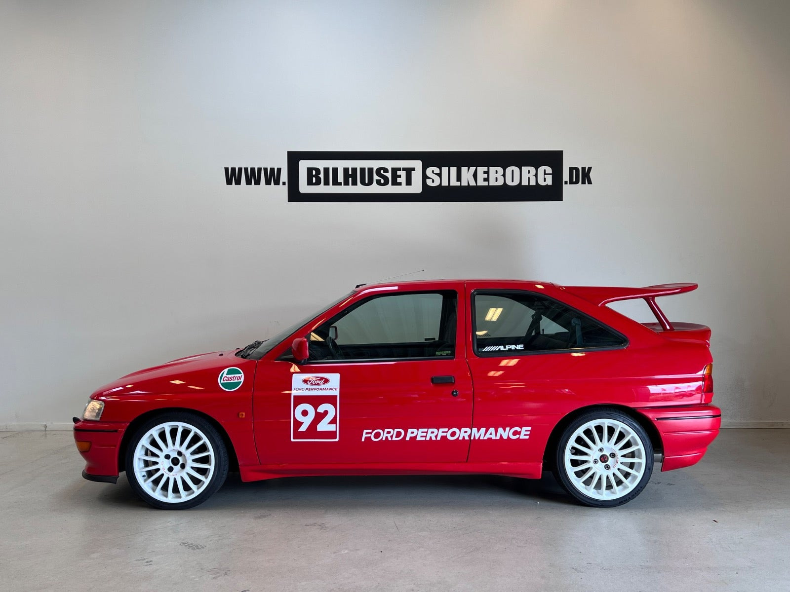 Orange Ford Escort fra 1992