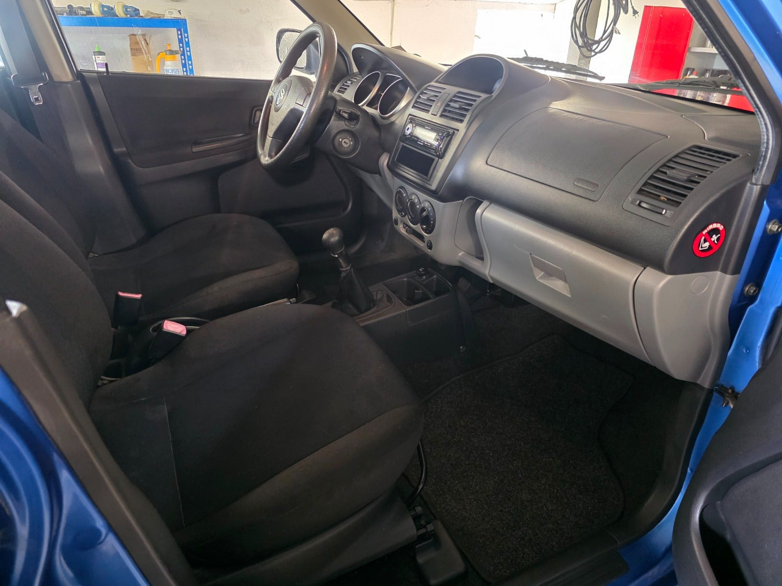Gul Suzuki Ignis fra 2005