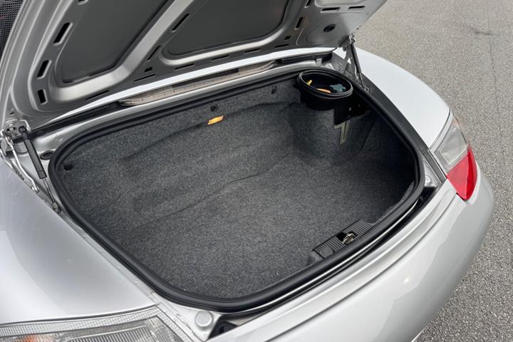 Sølv Porsche Boxster fra 1999