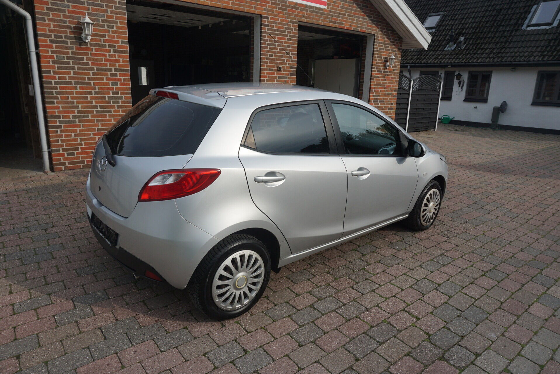 Sølv Mazda 2 fra 2009