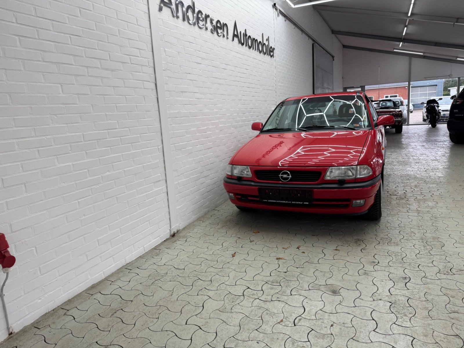 Rød Opel Astra fra 1997