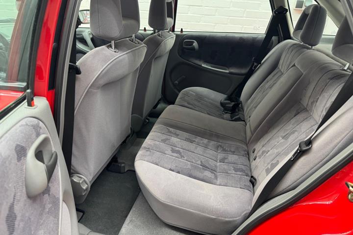 Rød Opel Astra fra 1997