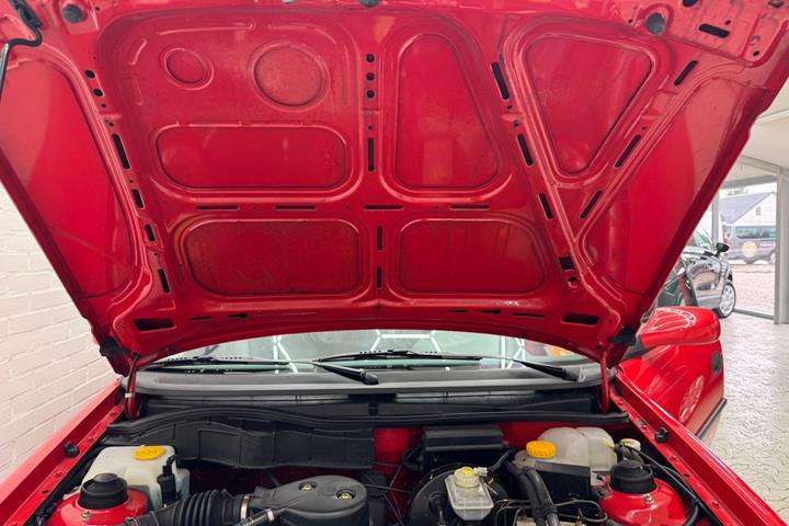 Rød Opel Astra fra 1997