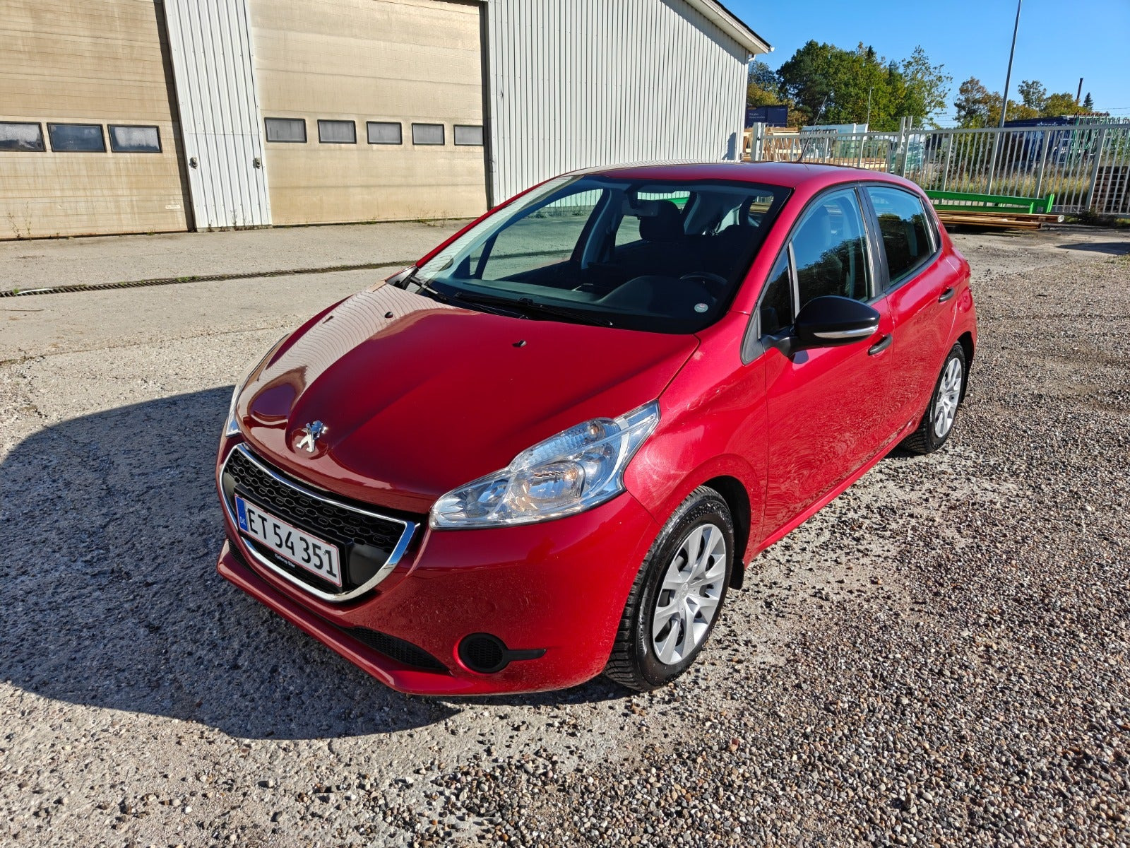 Gul Peugeot 208 fra 2014