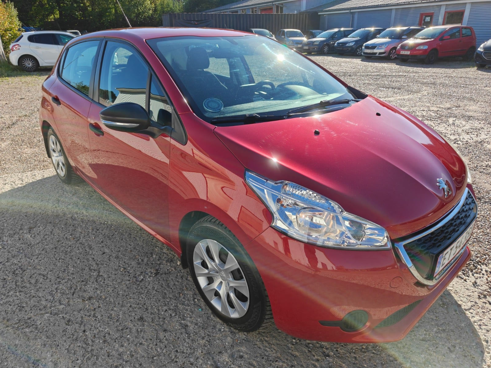 Gul Peugeot 208 fra 2014