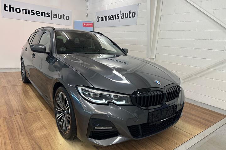 Grå BMW 320d fra 2021