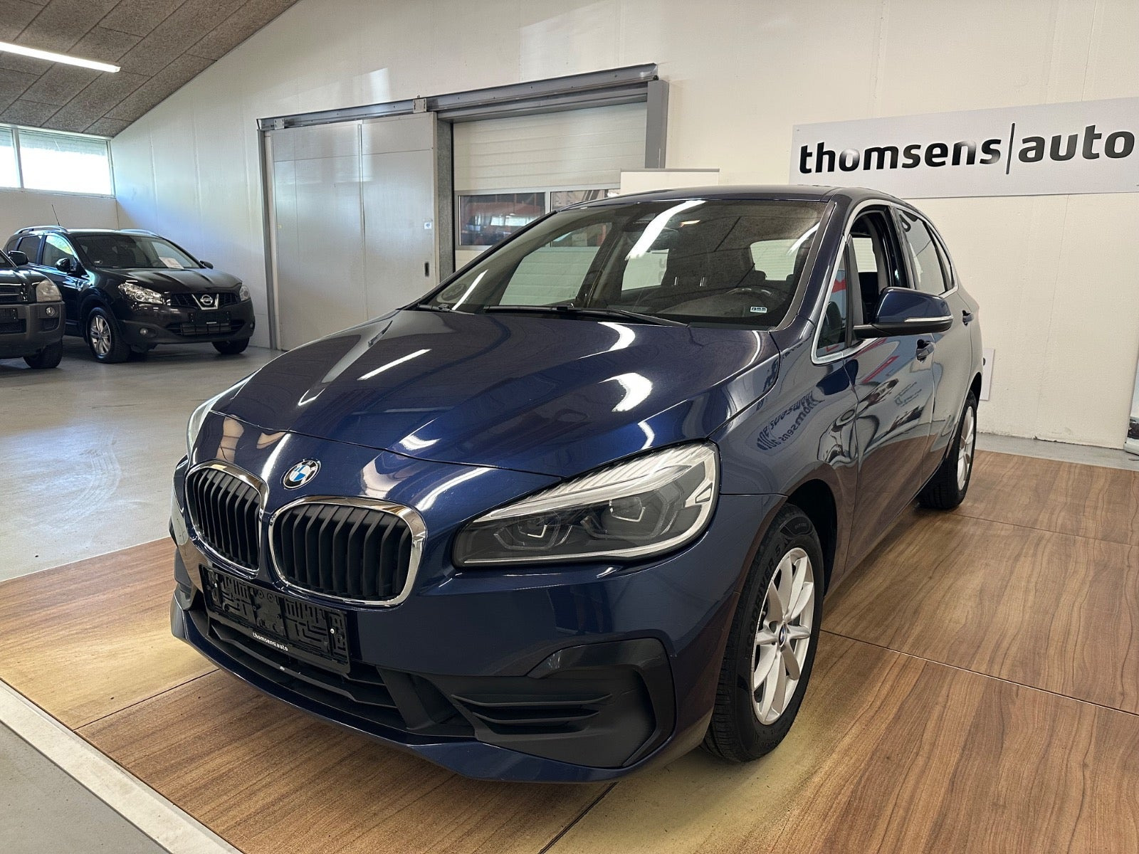 Blå BMW 218d fra 2019
