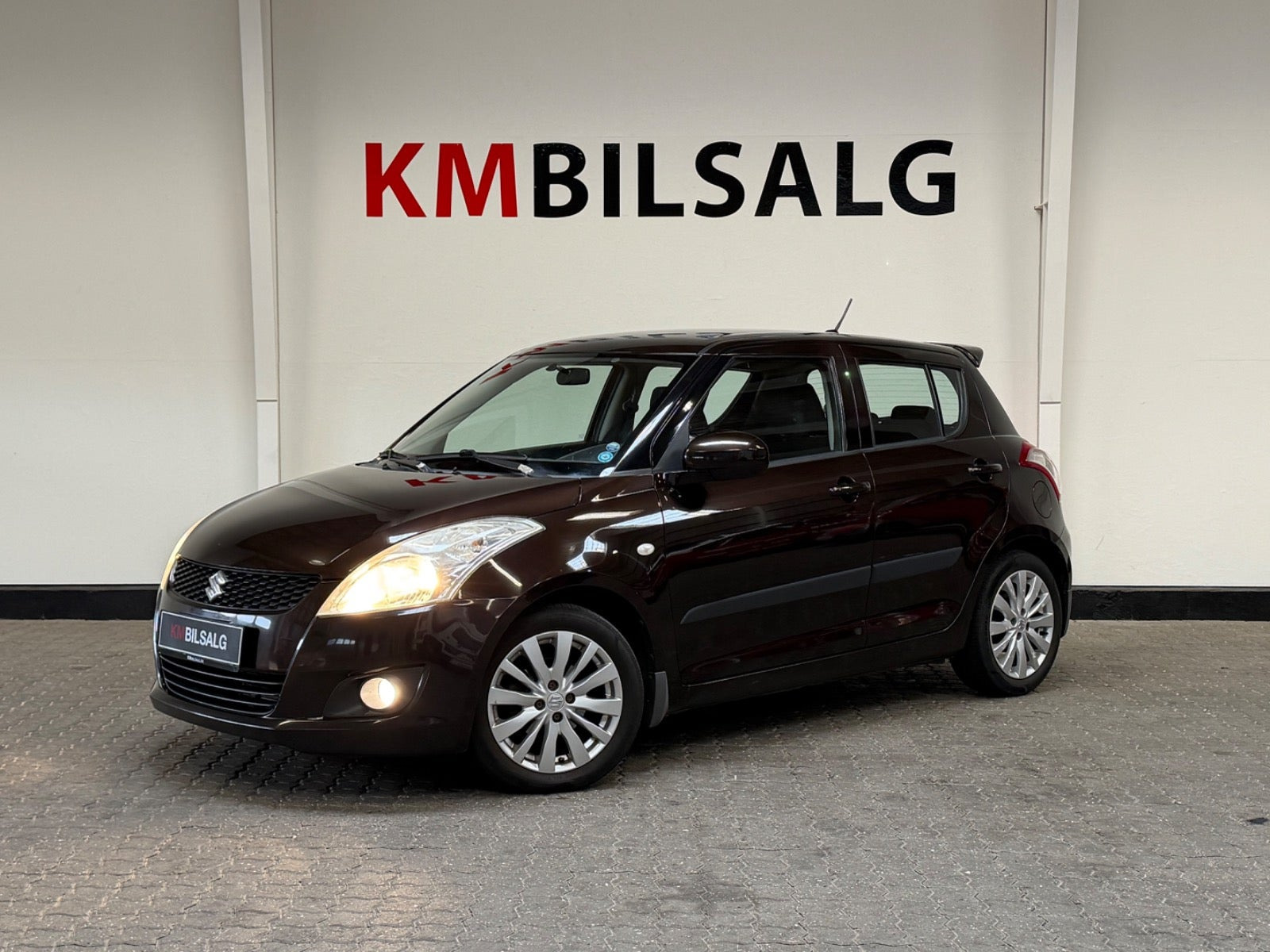 Brun Suzuki Swift fra 2012