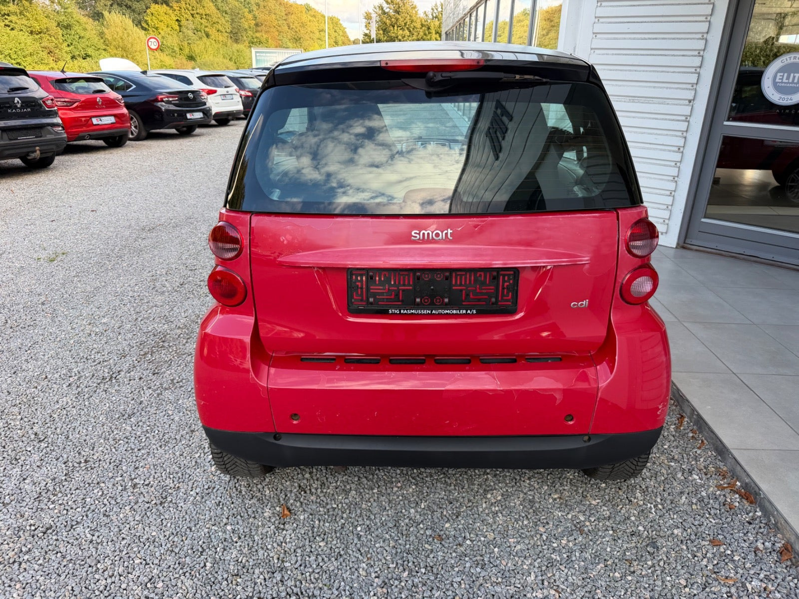 Rød Smart ForTwo Coupé fra 2010