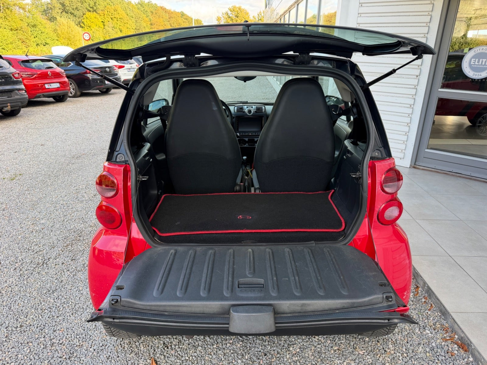 Rød Smart ForTwo Coupé fra 2010