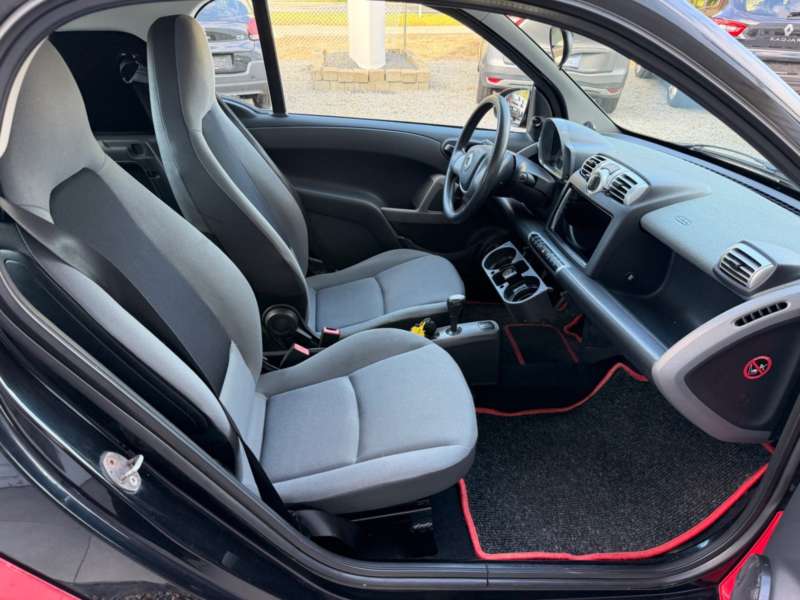 Rød Smart ForTwo Coupé fra 2010