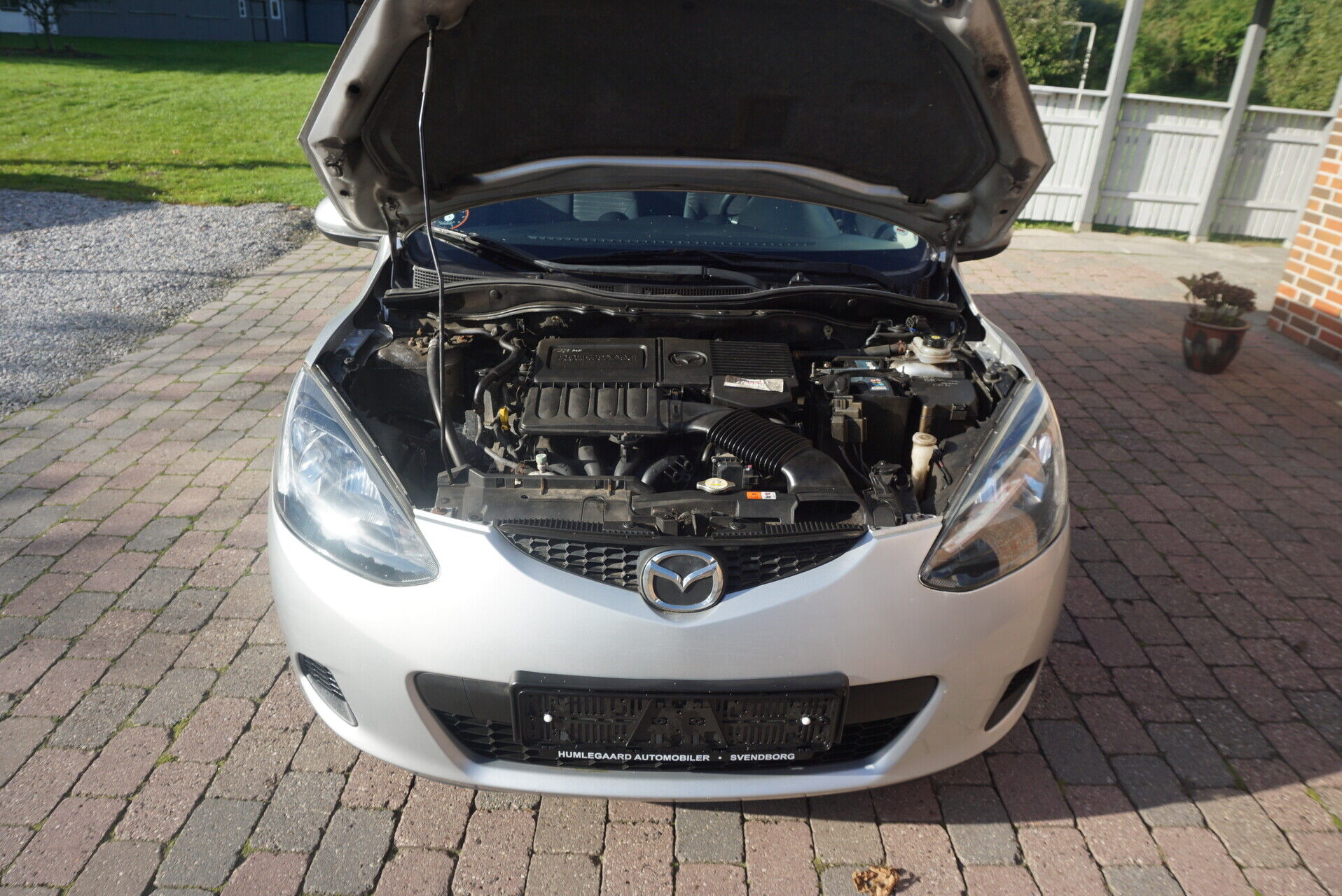 Sølv Mazda 2 fra 2009