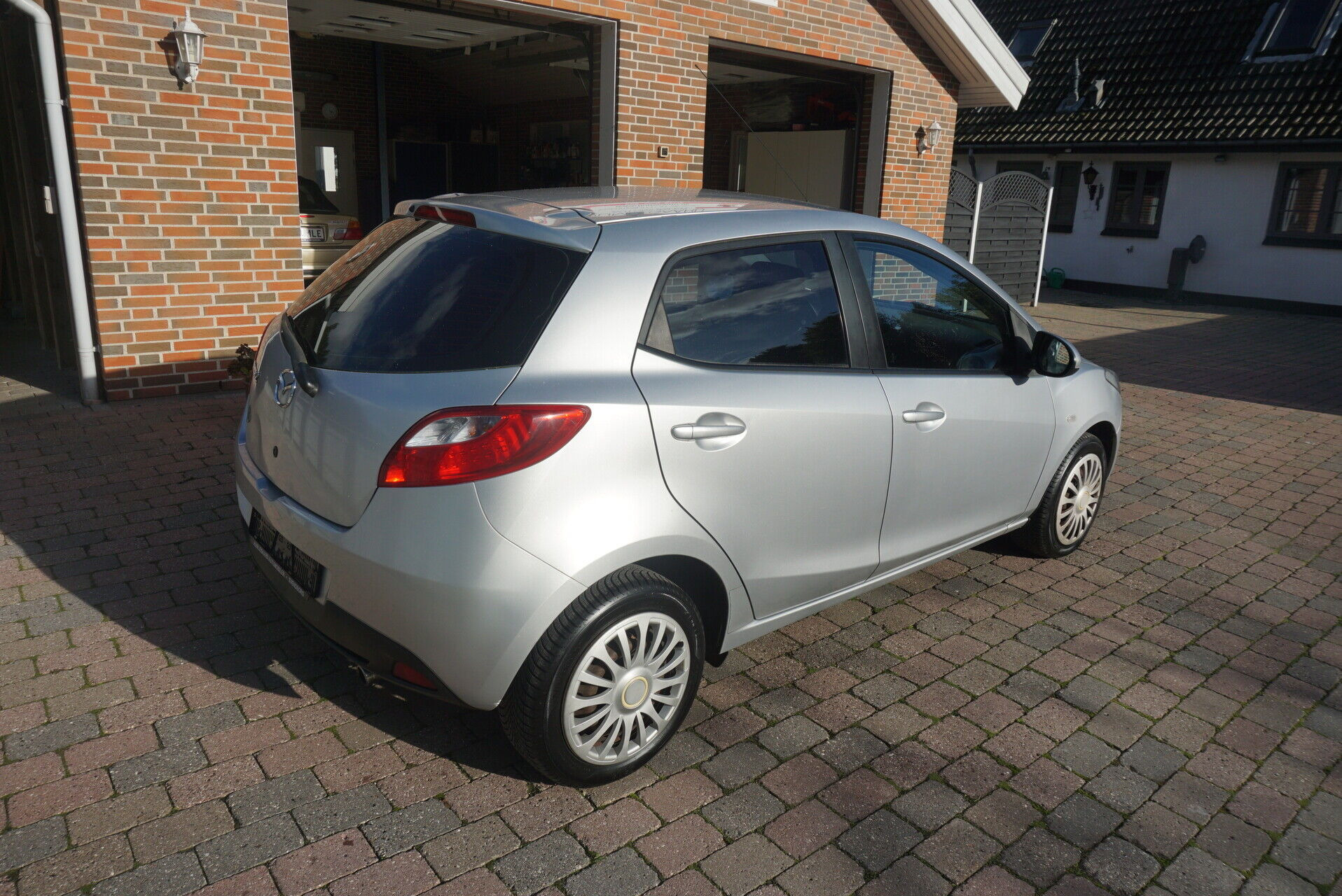 Sølv Mazda 2 fra 2009