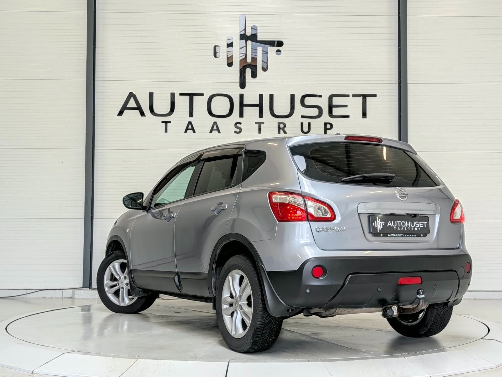 Sølv Nissan Qashqai fra 2011
