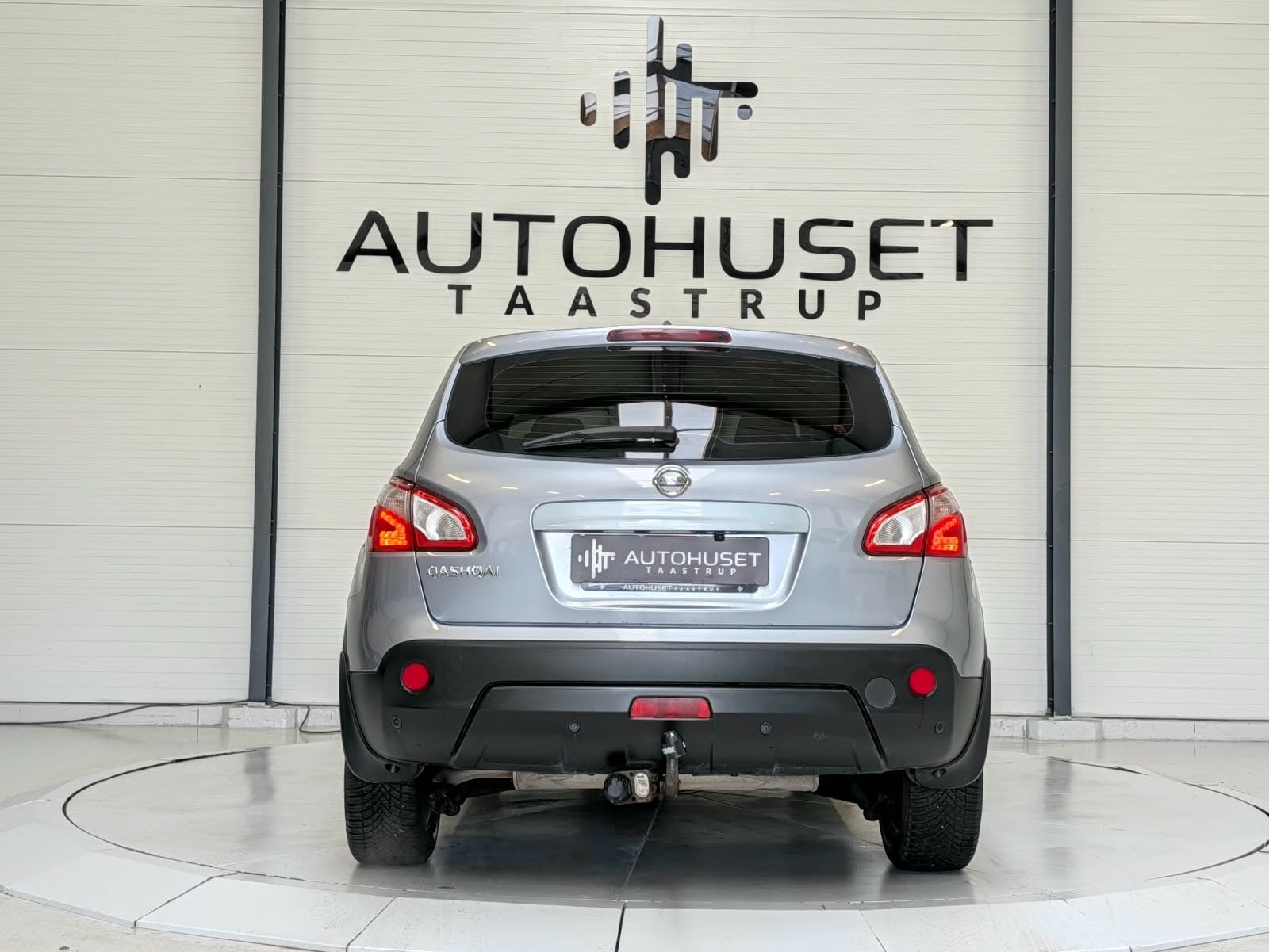 Sølv Nissan Qashqai fra 2011