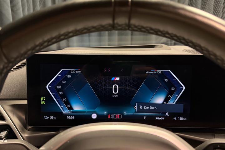 Blå BMW i4 fra 2024