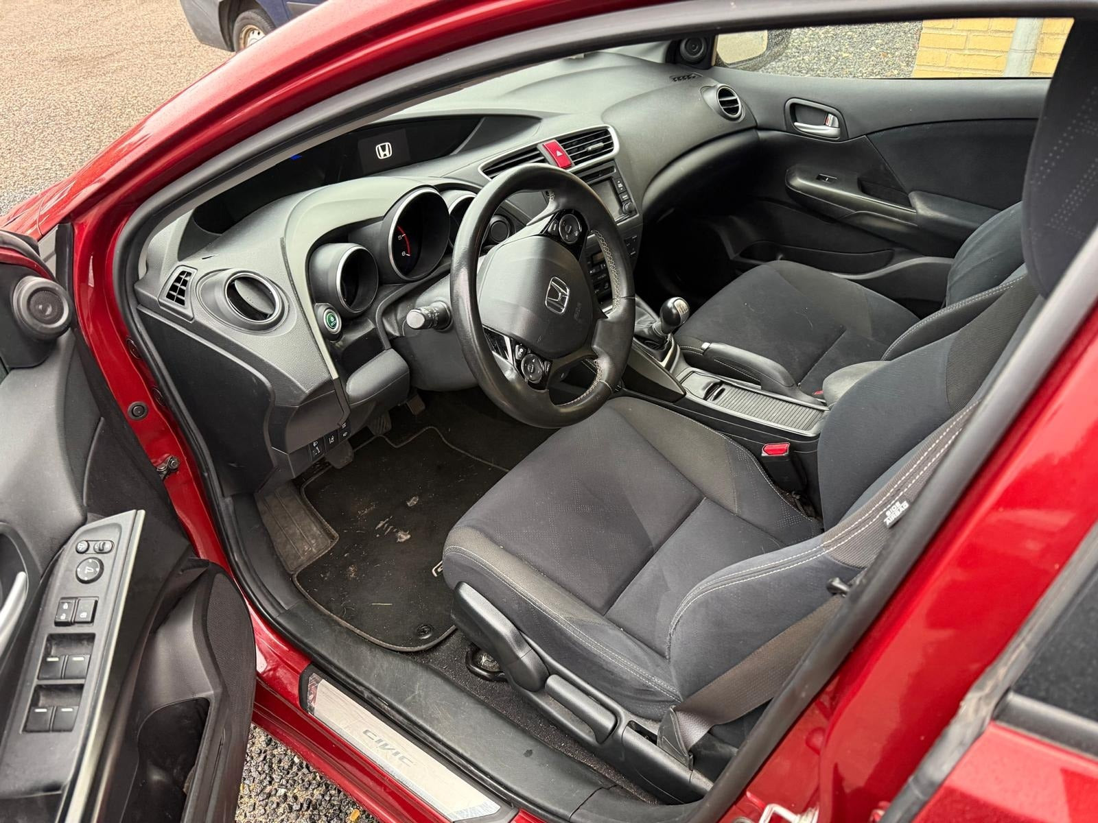 Orange Honda Civic fra 2014