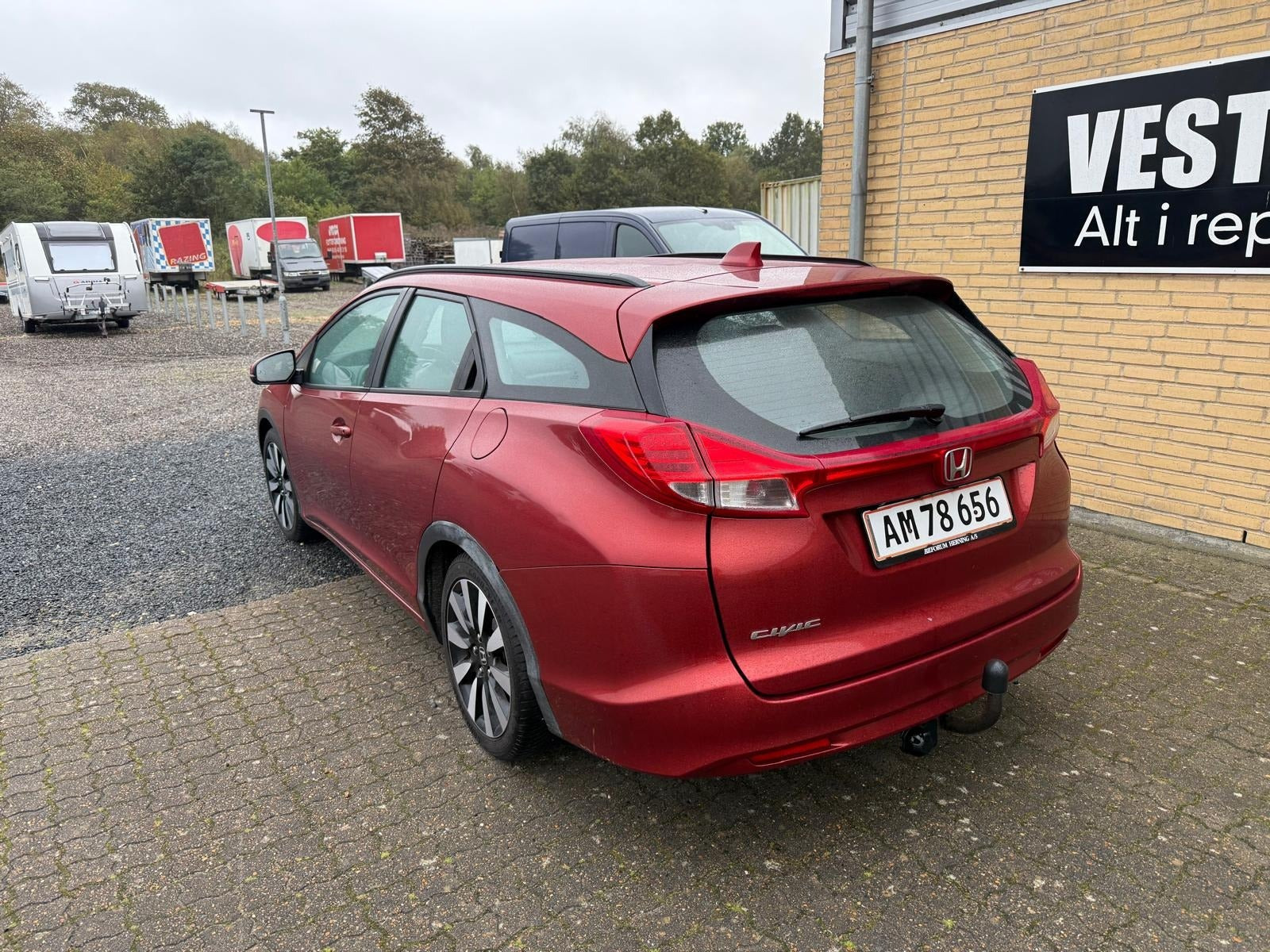 Orange Honda Civic fra 2014