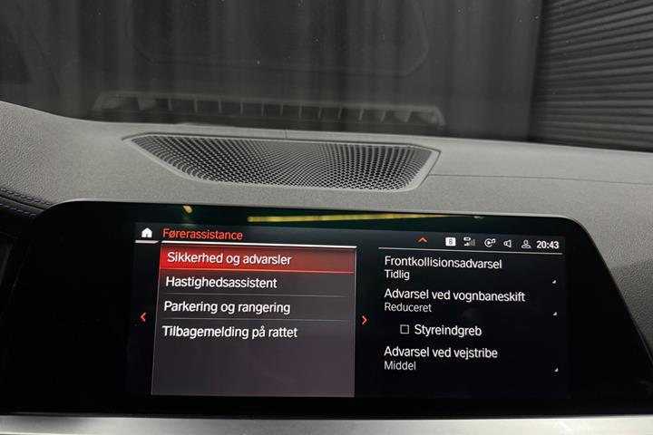 Grå BMW 440i fra 2021