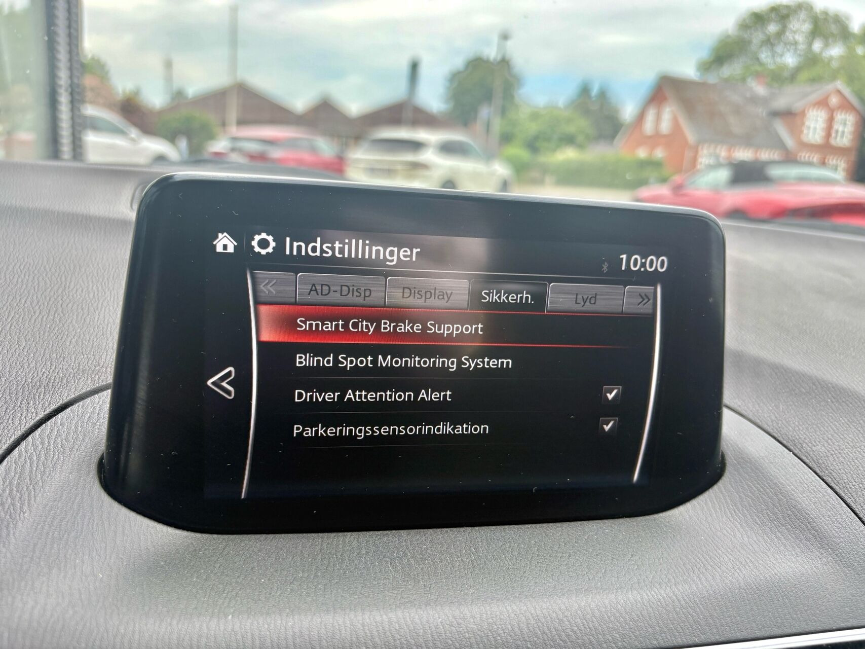 Rød Mazda 3 fra 2018