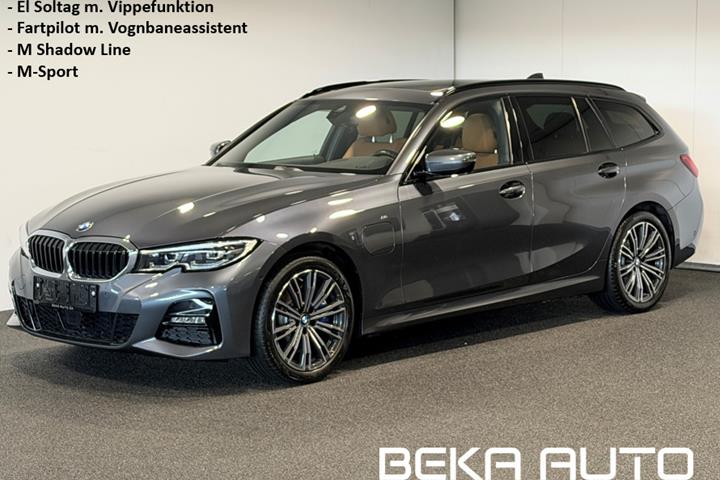 Grå BMW 330e fra 2021